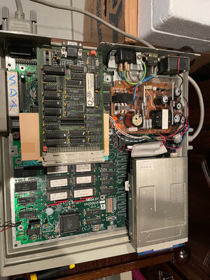 The QVME board inside an Atari
